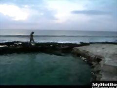 April Flowers and Sydnee Steele are out on the beach taking off their