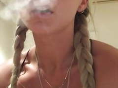 Sexy blond smoking